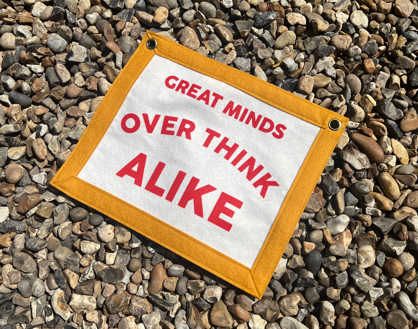 Great Minds Over Think Alike (Red & Mustard Banner)