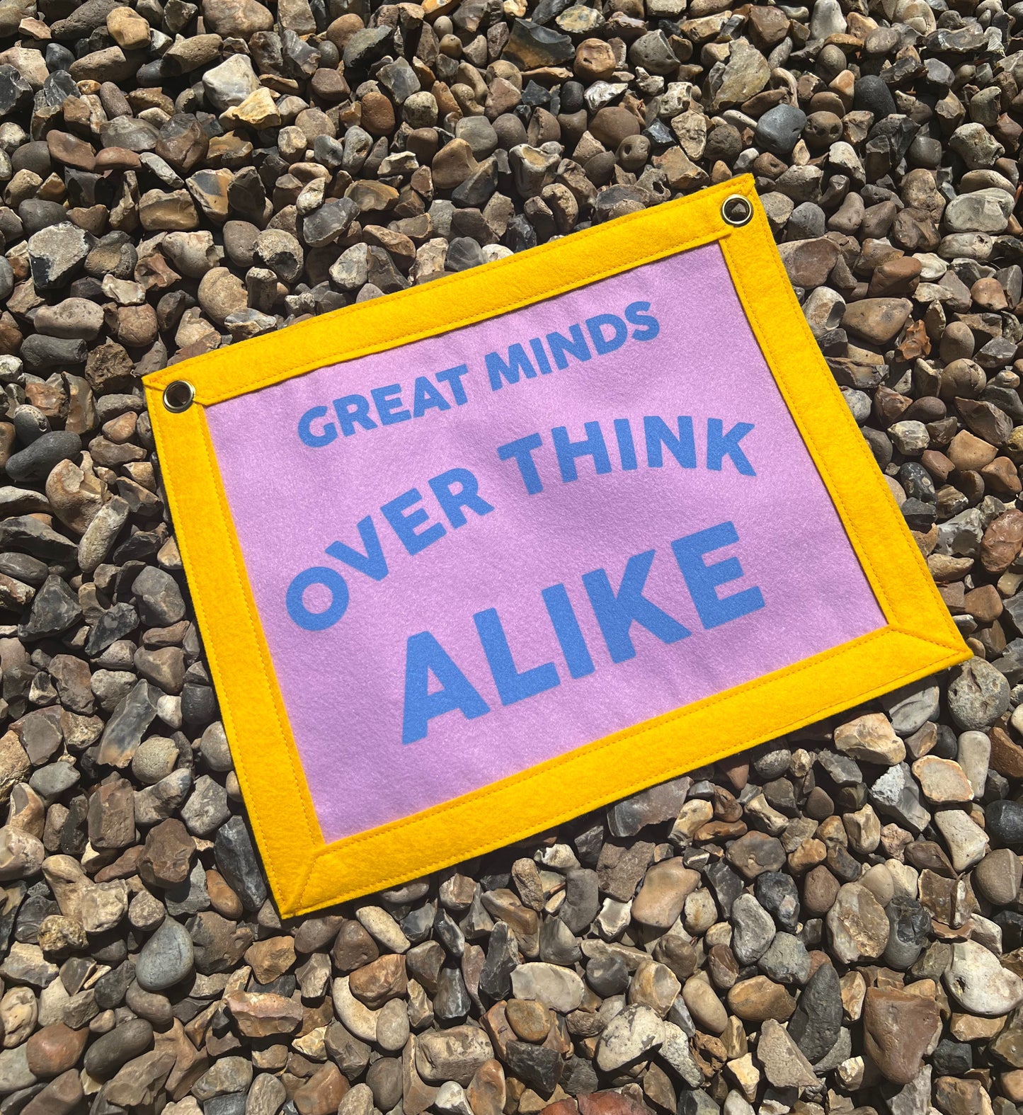 Great Minds Over Think Alike (Purple & Yellow Banner)